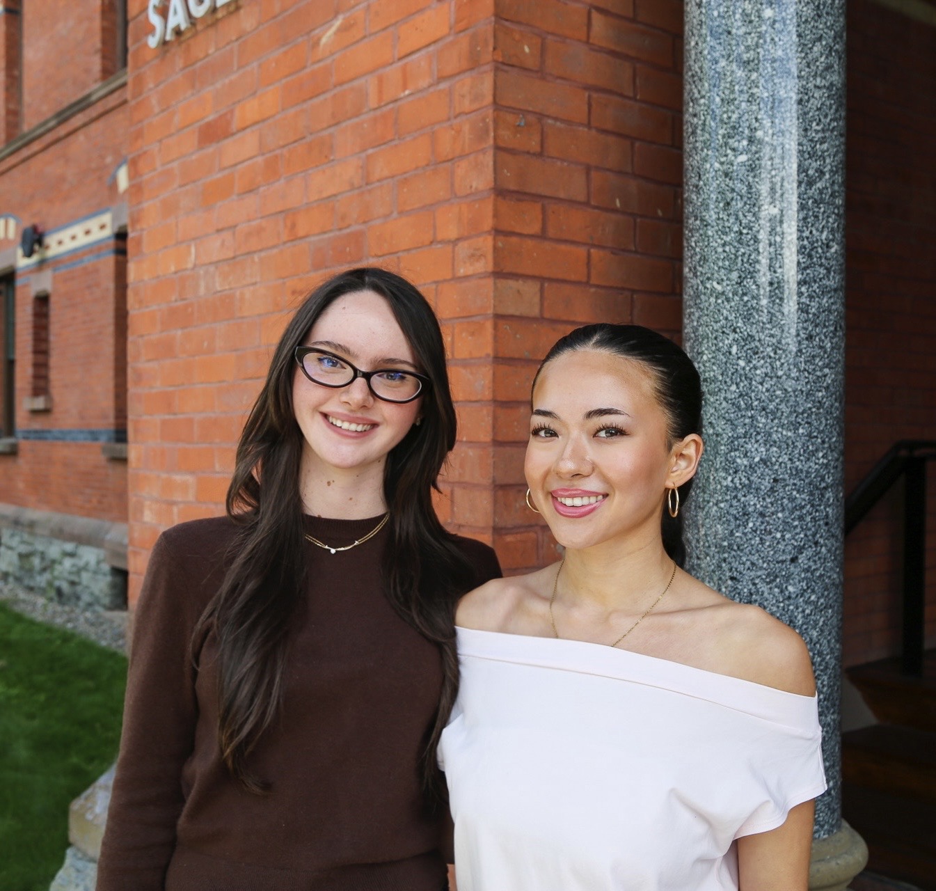 Gild co-founders Adriana Burnett and Sarah Van Horn together outside Sage Hall